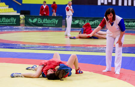 Russia, Vladivostok, 06/30/2018. Wrestling competition among girls born in 2003-2004. Teenage tournament of martial arts and fighting sports.のeditorial素材