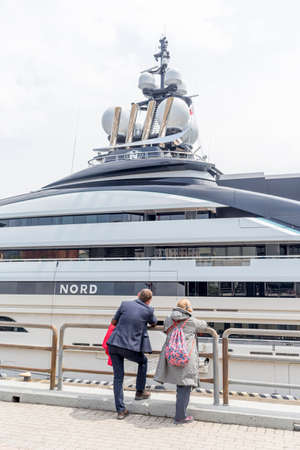 Vladivostok, Russia, May 16, 2022. People admires luxury yacht NORD at the pier. The yacht is owned by Alexei Mordashov, the Russian billionaire and owner of Severstal (steel and mining company).のeditorial素材