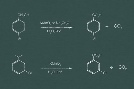 chemical reaction written with chalk on chalkboard