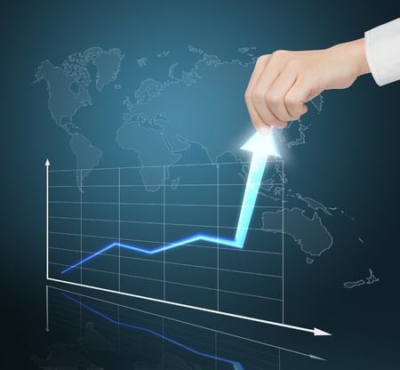 hand pulling financial business graph to high growth rate