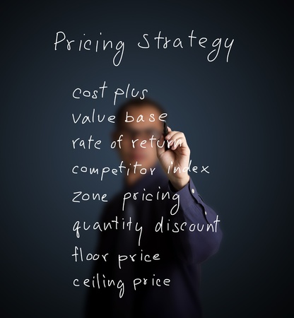 business man writing marketing concept - pricing strategyの写真素材