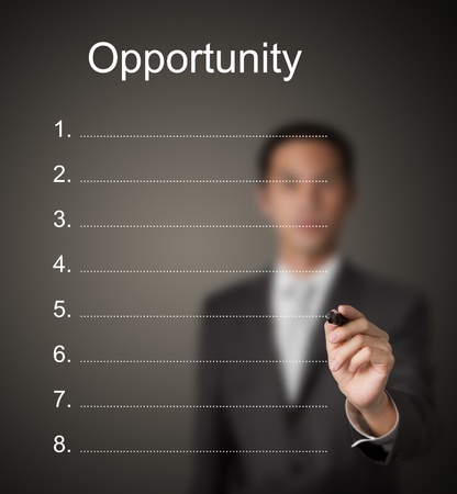 businessman writing blank  opportunity listの写真素材