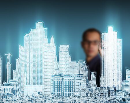 business man drawing modern urban city buildingの写真素材