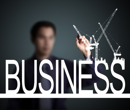 business man drawing  construction of businessの写真素材