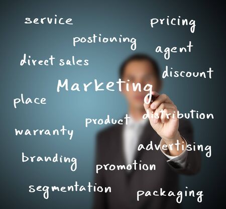 businessman writing marketing conceptの写真素材