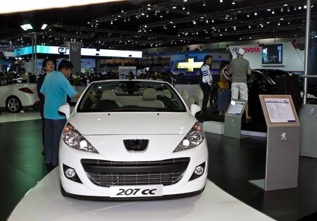 BANGKOK - DECEMBER 2: Peugeot 207cc car  on display at the 28th Thailand International Motor Expo exhebition on December 2, 2011 in Bangkok, Thailand.のeditorial素材