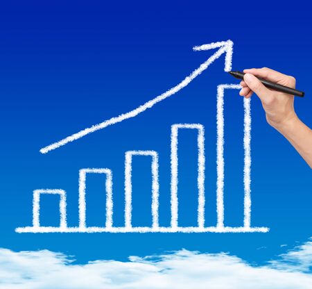 business hand drawing cloud upward trend graph on blue skyの写真素材