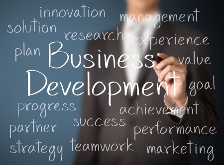 business man writing business development conceptの写真素材