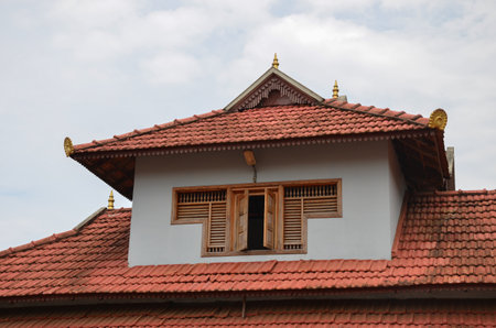 Traditional architecture of a tiled roof house in Kerala, using mainly wood Mangalore Tilesの写真素材