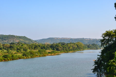 Phalguni River with lush green river bank  at Polali, Mangalore, India