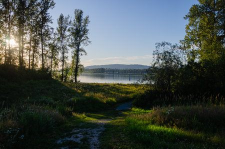 Sunset on the Fraser River, Mission, British Columbia, Canadaの写真素材