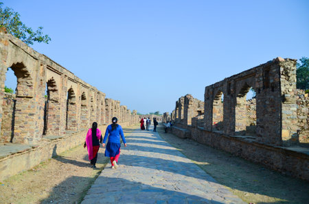 Stone wall with arches in the ruins of 16th century Bhangarh fort at Alwar, Rajasthan, Indiaの写真素材