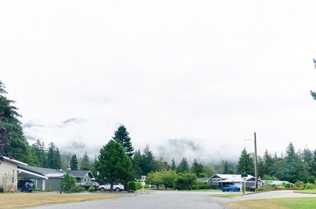 Hope town in  British Columbia, Canada with cloud covered mountains in the background