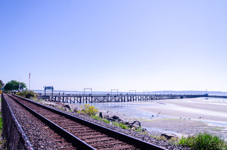 Railway along the coastline at White Rock, Surrey, British Columbia, Canadaの写真素材
