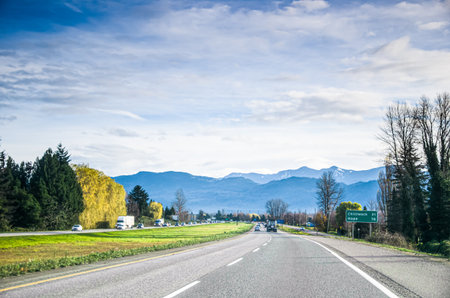 Beautiful View of rural canada on Highway from Abbotsford to Hope in  BC, Canada with mountains,...