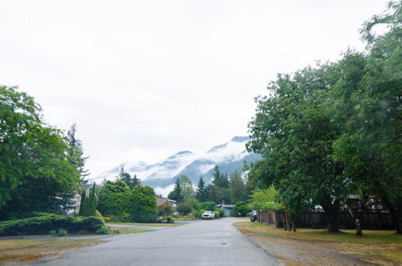 Hope town in  British Columbia, Canada with cloud covered mountains in the background