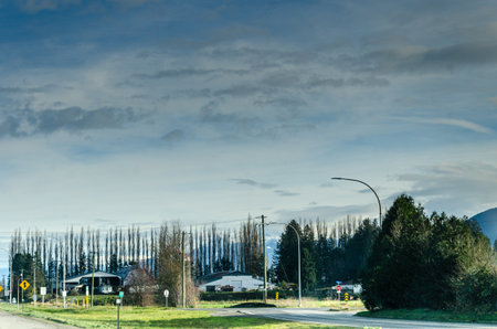View of rural canada on Highway from Abbotsford to Hope in  BC, Canada with mountains, valleys and...