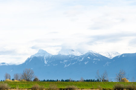 View of rural canada on Highway from Abbotsford to Hope in  BC, Canada with mountains, valleys and...