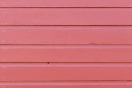 Original Scandinavian wood texture painted in Falu-red 3. The color is authentic and not modified anyhow. Images are taken from real house fronts in Scandinavia.の写真素材