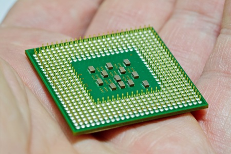Closeup of the central processor on the palm with selected focus