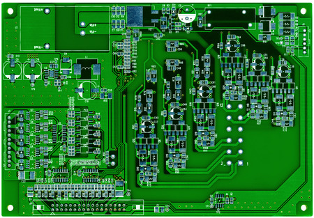 Green printed circuit board ready for assembling isolated on whiteの写真素材