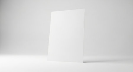 Blank white paper sheet on white background. 3D rendering.の素材