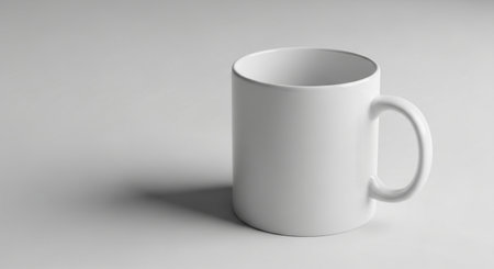 White mug mockup on white background. 3D rendering illustration.の素材