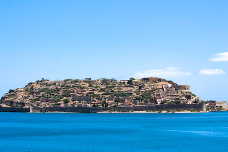 Abandoned old fortress and former leper colony, island Spinalonga, Crete, Greece. Ruined old buildings, abandoned in the late 1950s. "Cursed Island"の写真素材
