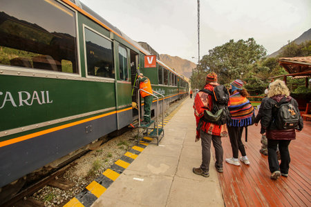Ollantaytambo, Peru - May 25 2022: Tourist train from Cusco to Machu Picchu standing at Ollantaytambo stationのeditorial素材