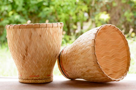Earthenware steamer is the bamboo container for cook glutinous riceの写真素材