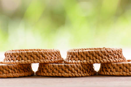 Saucer or plate made of bamboo which is the basketwork.の写真素材