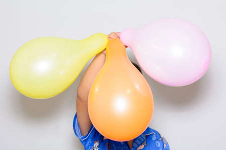 Balloons three color on white background の写真素材
