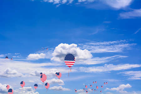 Flag of United States of America on a balloon blue sky background.の写真素材