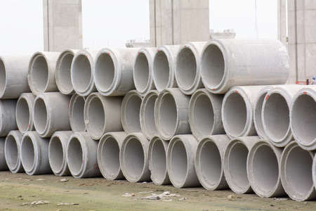Many concrete drainage pipe waiting for use.の写真素材