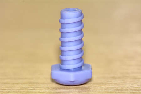 The purple hex head bolt toys is plastic.の写真素材