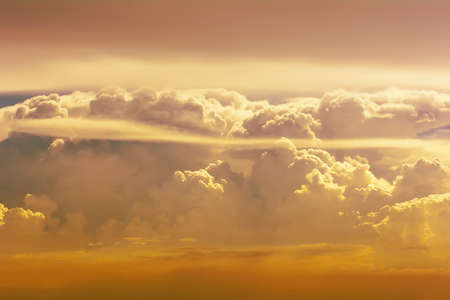 The golden cloudy sky on natural background.