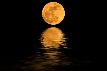 Super moon yellow and shadows in the water.