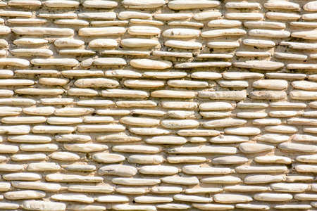 Stone wall texture made from stiff stone.の写真素材