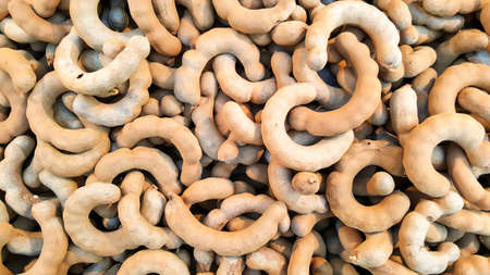 Tamarind stacks for sale a wait. Tamarind is a leguminous tree in the family Fabaceae indigenous to tropical Africa.の写真素材