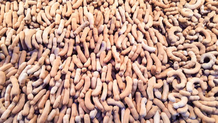 Tamarind stacks for sale a wait. Tamarind is a leguminous tree in the family Fabaceae indigenous to tropical Africa.の写真素材