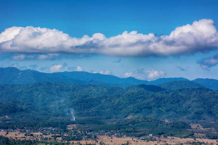Forests, mountains and blue cloudy sky are landscape in Thailand.の写真素材