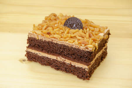 Cake on the wood background.