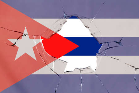 Flag of Cuba on a on glass breakage.の写真素材