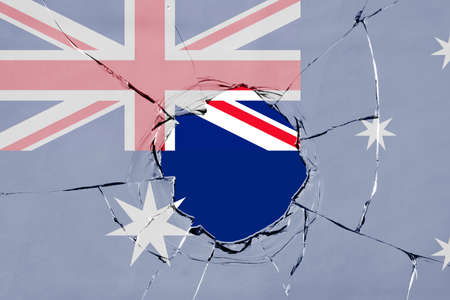 Flag of Australia on a on glass breakage.の写真素材