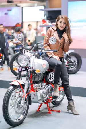 Nonthaburi, Thailand - DEC 3, 2019: Unidentified model poses with a car at The 36th Motor Expo...