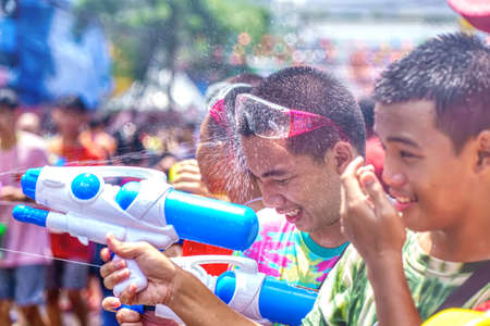 Siam Square, Bangkok, Thailand - APR 13, 2019: short action of people joins celebrations of the Thai New Year or Songkran in Siam Square.のeditorial素材