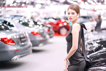 Nonthaburi, Thailand - NOV 28, 2019: Unidentified model poses with a car at The 36th Motor Expo...