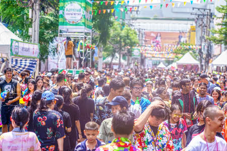 Siam Square, Bangkok, Thailand - APR 13, 2019: short action of people joins celebrations of the Thai New Year or Songkran in Siam Square.のeditorial素材