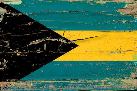 3D Flag of Bahamas on a old wood wall background.の写真素材