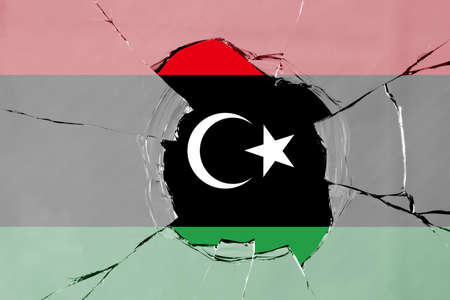 3D Flag of Libya on a glass breakage.の写真素材